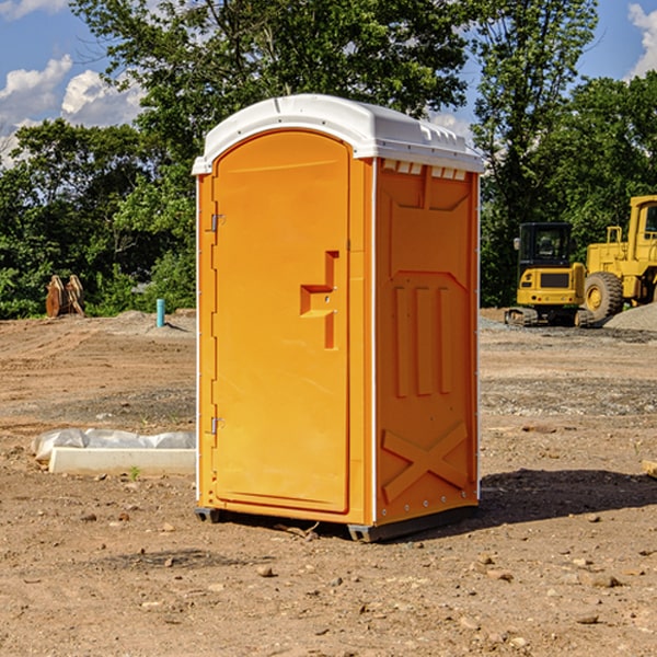 what is the cost difference between standard and deluxe portable restroom rentals in Russellville AR